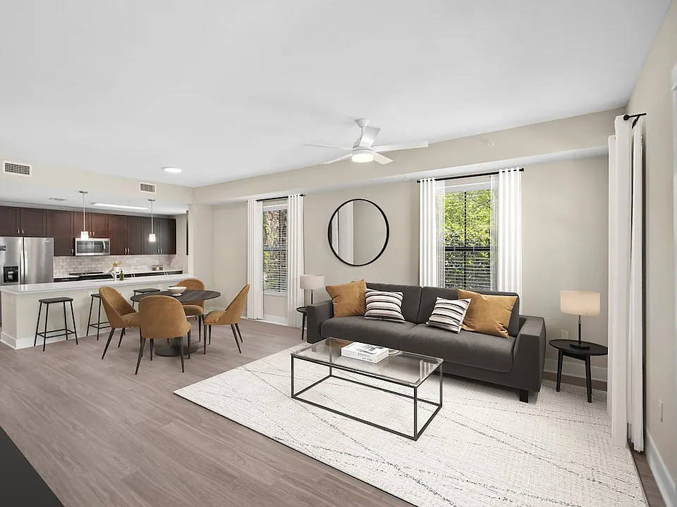 Updated Finishes living and dining area with hard surface flooring