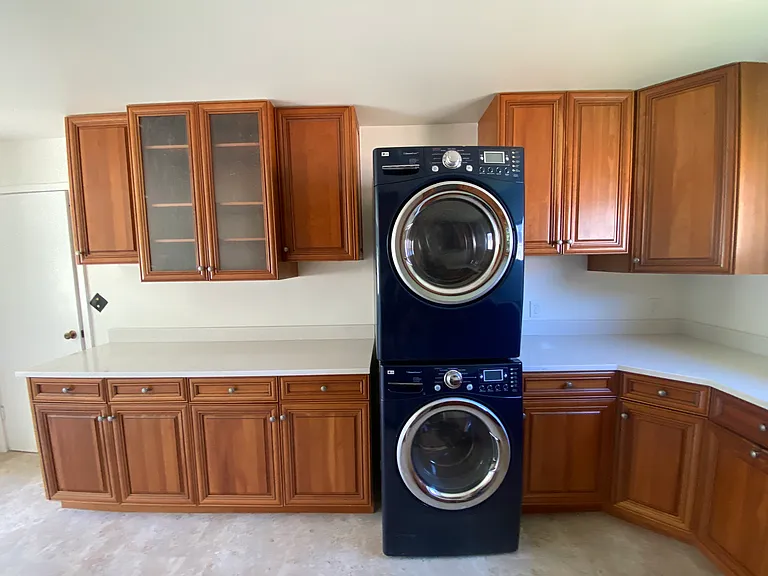 Kitchen: washer and dryer hook ups. More cabinets and quartz counter space.