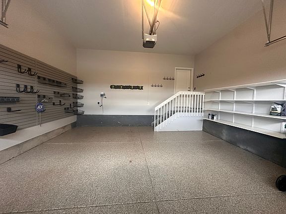2-car garage with complete storage and organization with epoxy concrete