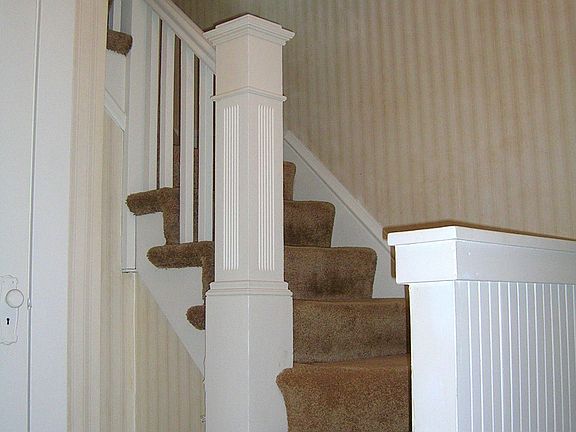 Orig staircase has hardwoods under carpet