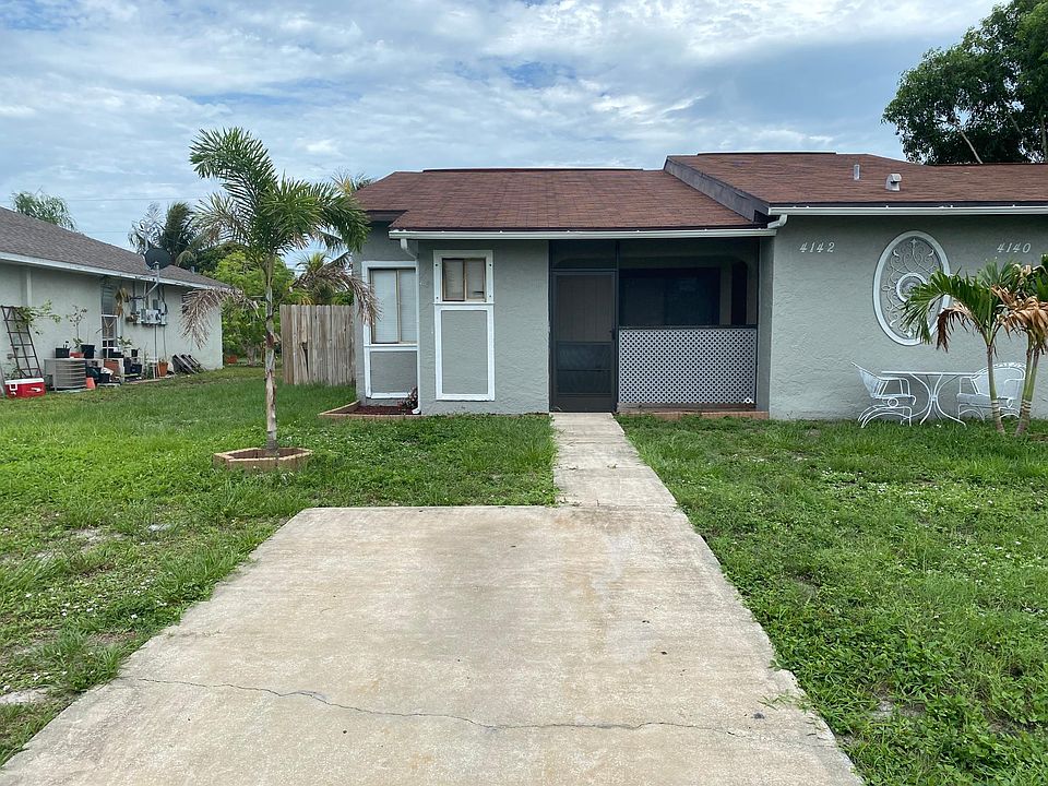 Front entrance, private patio where the fence is on the left