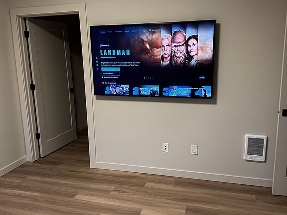This 65" HDTV is already mounted in the Master Bedroom for you to enjoy!