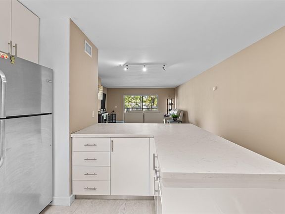 3rd image of 8511 Old Country Manor #408