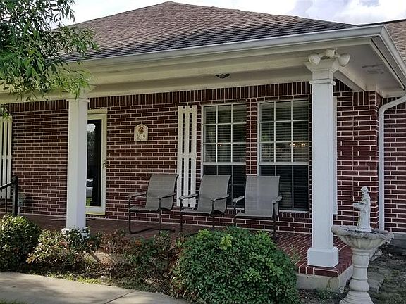 All Brick veneer home is a great neighborhood....a front porch for sitting and enjoying the friendly neighborhood