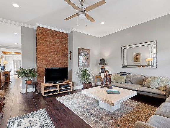 Gas fireplace is behind TV