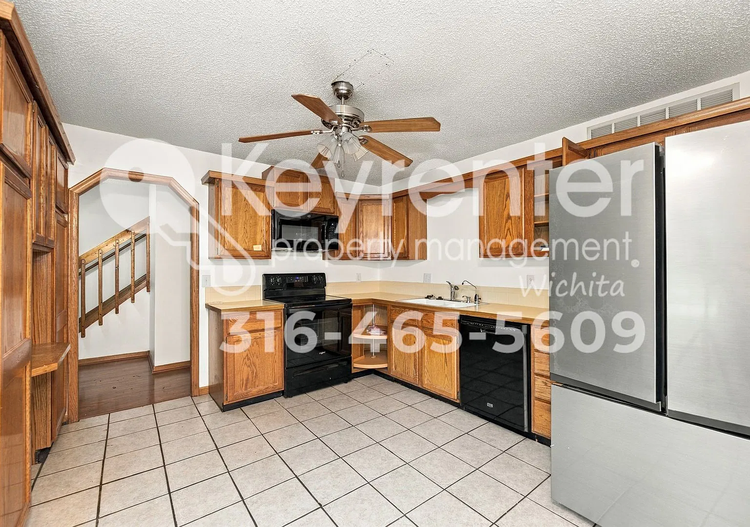 Spacious 3-Bedroom Home with Finished Basement & Fireplace — Photo 3