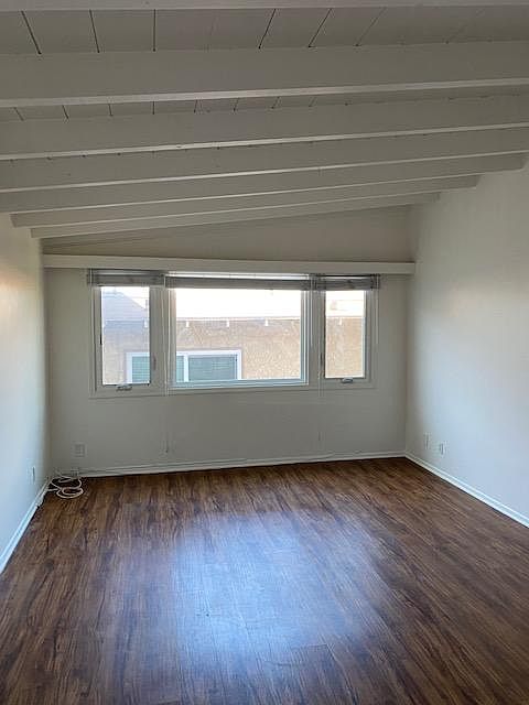 Living Room with lots of light and beamed ceilings