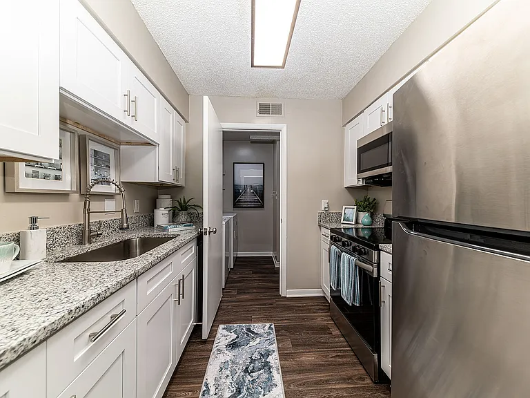 Kitchen with granite counters and stainless appliances