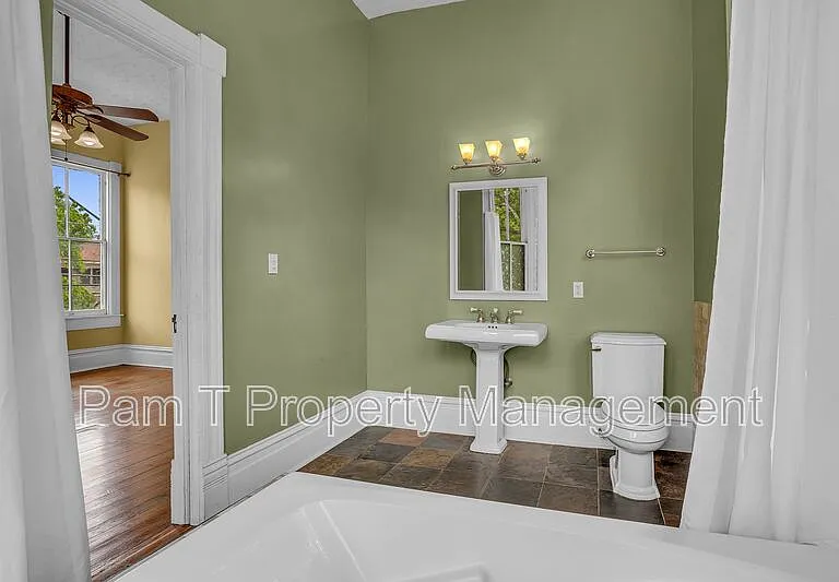 201 W 37th St #MAIN HOUSE — Photo 26