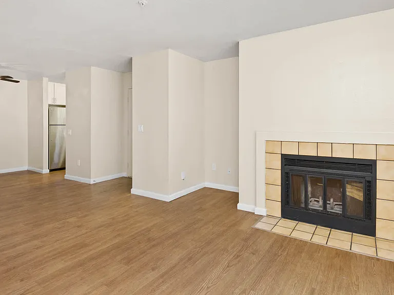 Living Room with Fireplace and Hard Surface Flooring