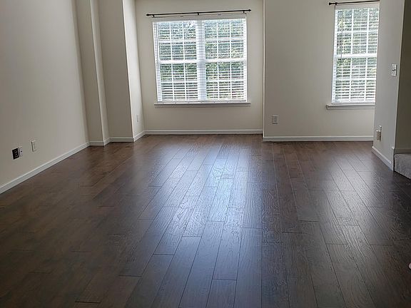 Very spacious living room with new wood flooring