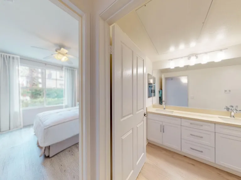 Private bath beside bedroom. A curtain could make it closer to a private master suite.
