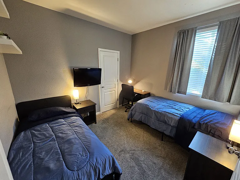 Bedroom #3 with (2) Twin Size Beds, Flat Screen TV w/Firestick and Desk Space