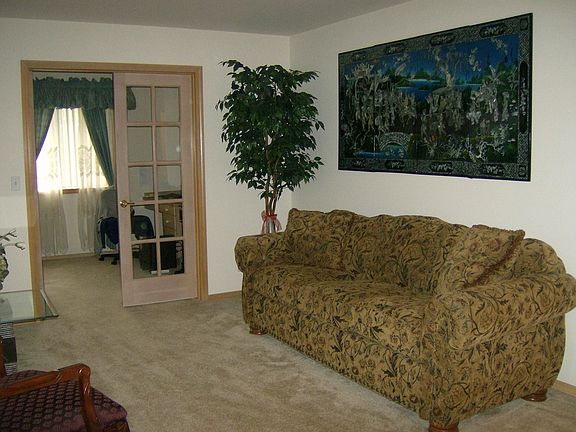 Formal Living Room/Den with French doors off of it.