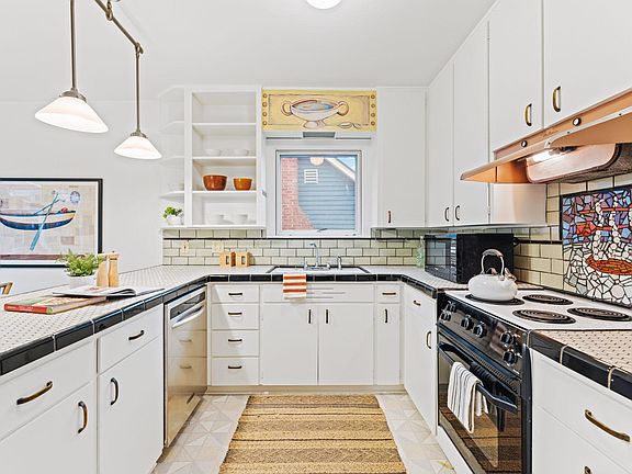 Light filled kitchen with d/w.