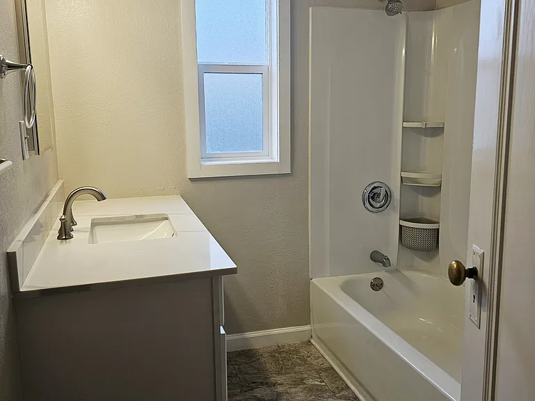 315 E 3rd St — Photo 11