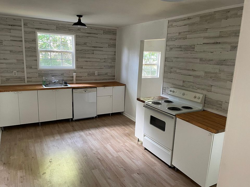 Kitchen, with large laundry room entrance to the right