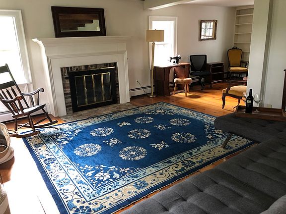 Formal Living Room with wood fireplace.