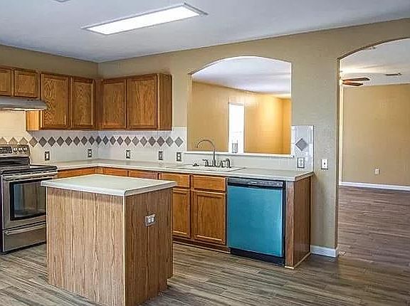 Kitchen with new tile continued from the living room.
