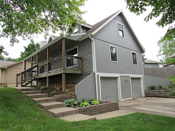 Front porch and 2-car garage