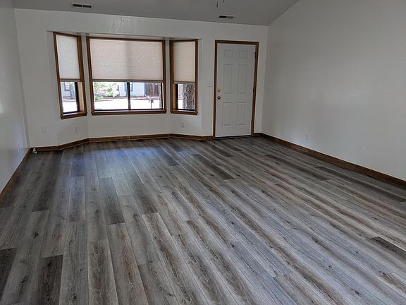 Front door, front windows and living room