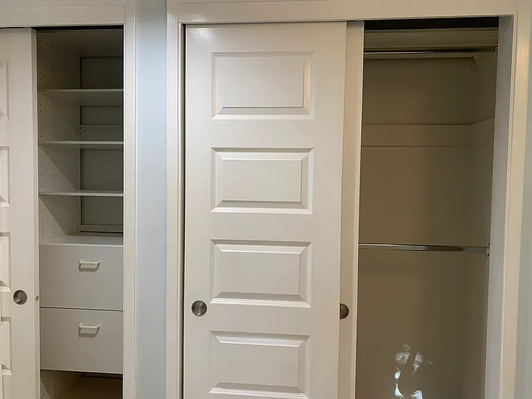 Custom closet system in the primary suite