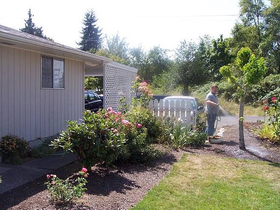 Carport Available. Background is the Lebanon Canal. Third Street ends at the canal.