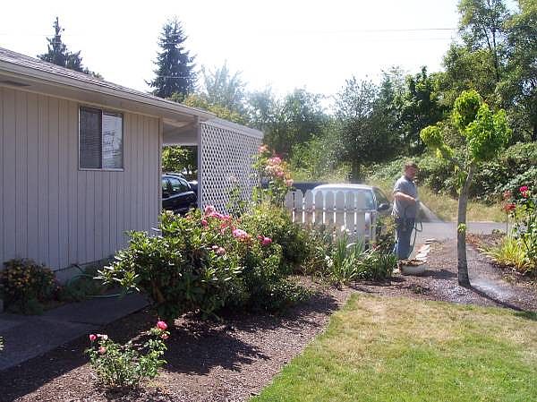Carport Available. Background is the Lebanon Canal. Third Street ends at the canal.