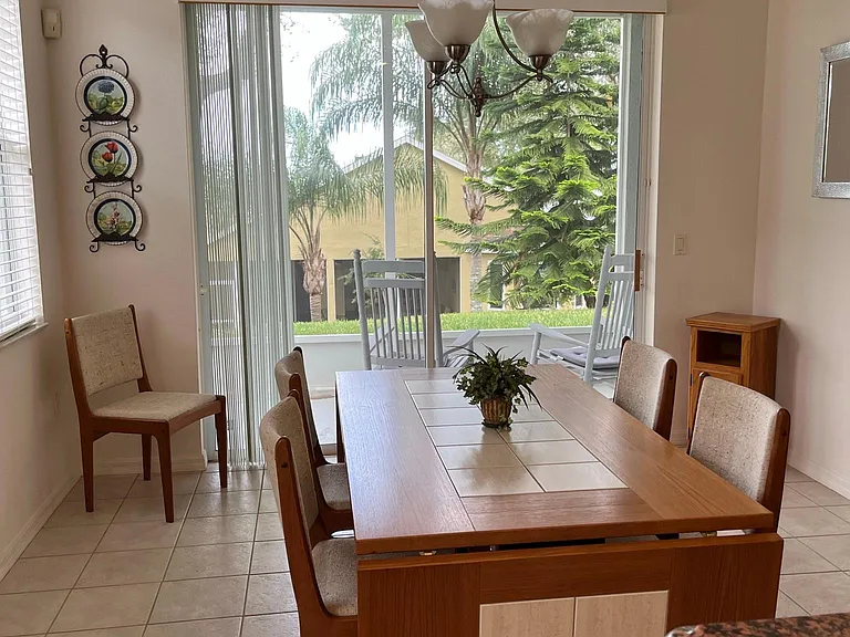 Dining area, next to lanai. Looks out onto backyard.