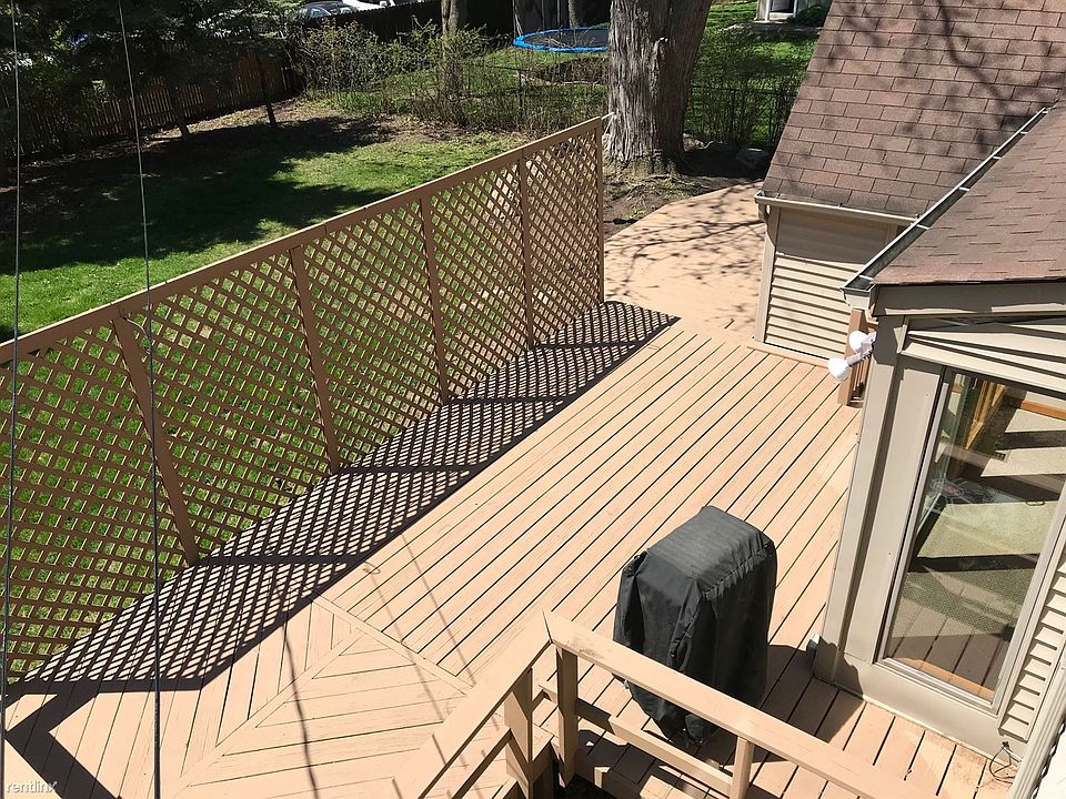 Large private multi-tiered deck with gas grill
