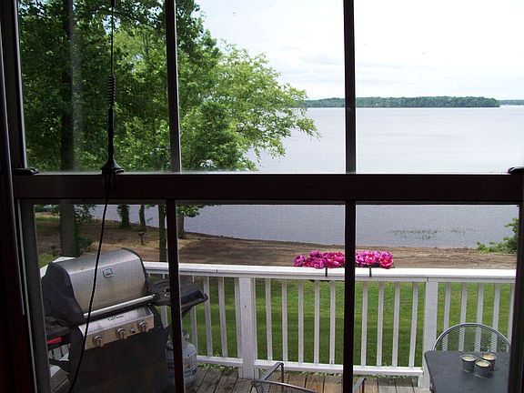From den overlooking deck & lake