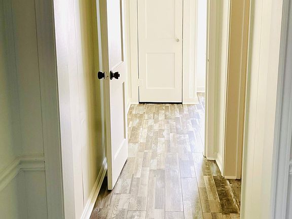 HALL TO BACK BEDROOM AND HALL BATH