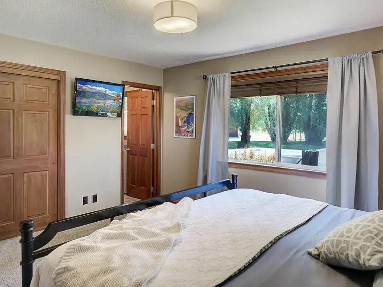 The primary suite enjoys 2 large windows, multiple closets, and an en suite bath