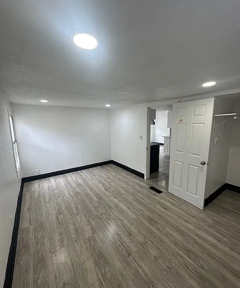 bedroom,can easily fit a king bed and dressers.