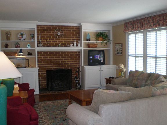 Family Room w/built-ins and brick fireplace