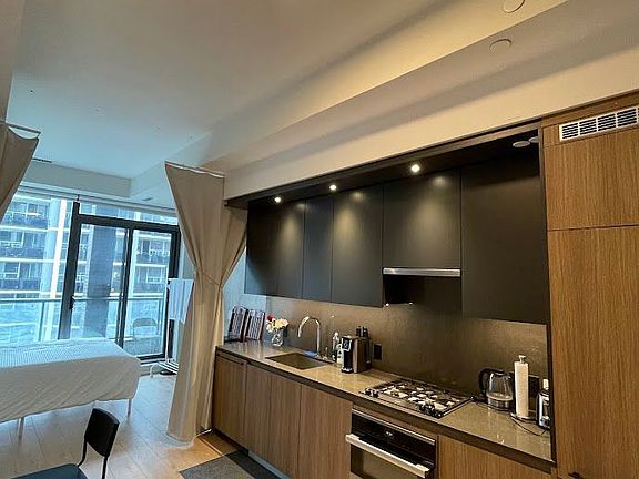 2nd image of 81 Wellesley St E #607