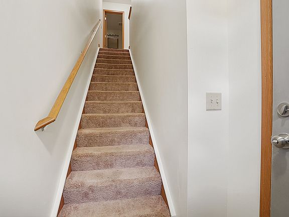 Stairs that lead tp first floor.