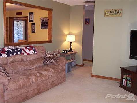 Living room pass through to dining area and kitchen.