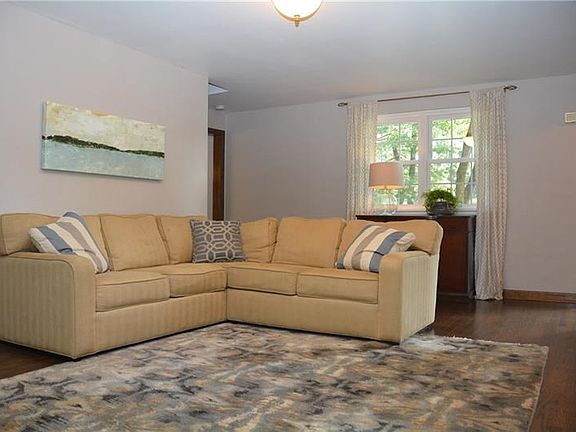 Bright and welcoming living room right off the entryway