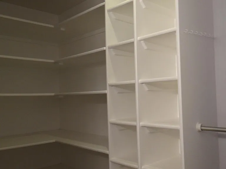 Walkin closet with lots of storage and space