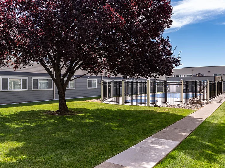 Americana | Outdoor Pool, Exterior Building and Walkway
