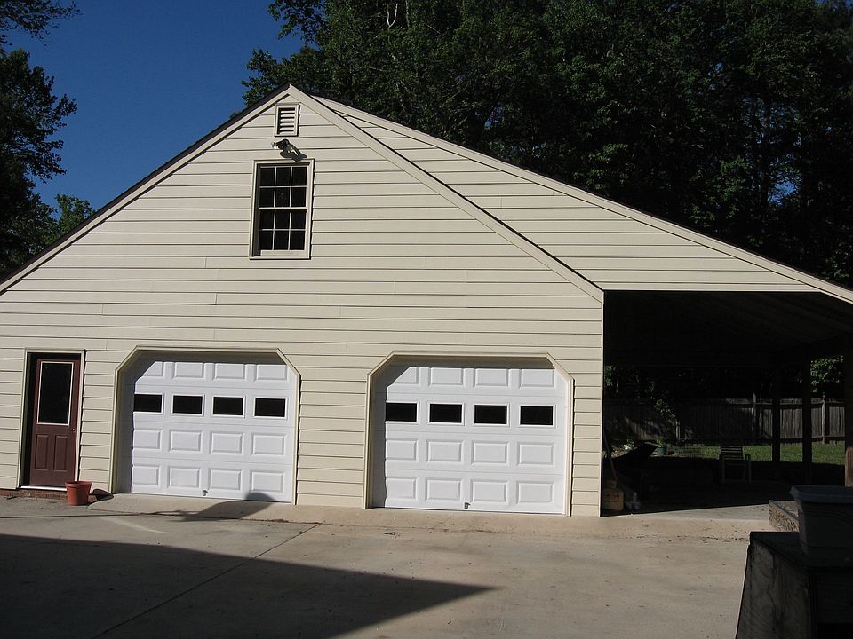 True 2.5 car Garage w/carport