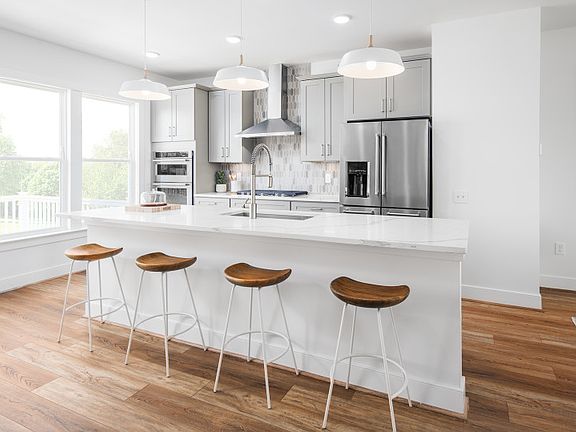 Kitchen Offers an Abundance of Cabinets and an Oversized Island