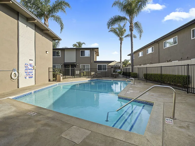 Community swimming pool at Olive Tree Townhomes in Costa Mesa, CA