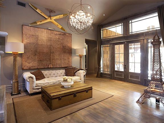 French doors with beveled glass windows leading to the living room.