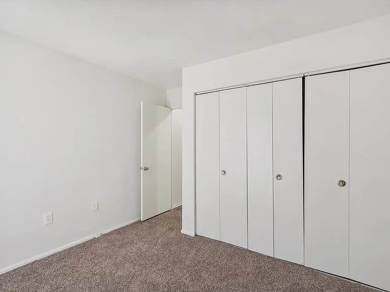 Bedroom with lots of closet space at Trillium in Fairfax, VA