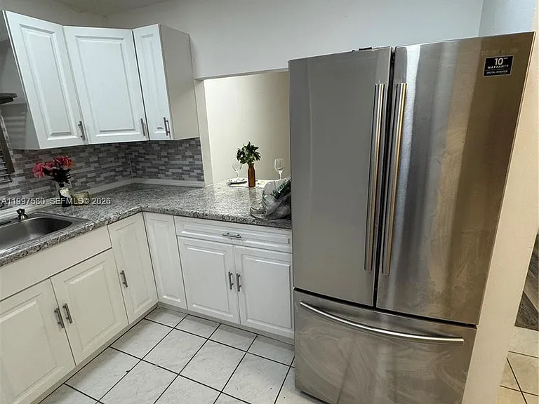 6150 NW 62nd St #106 — Photo 17