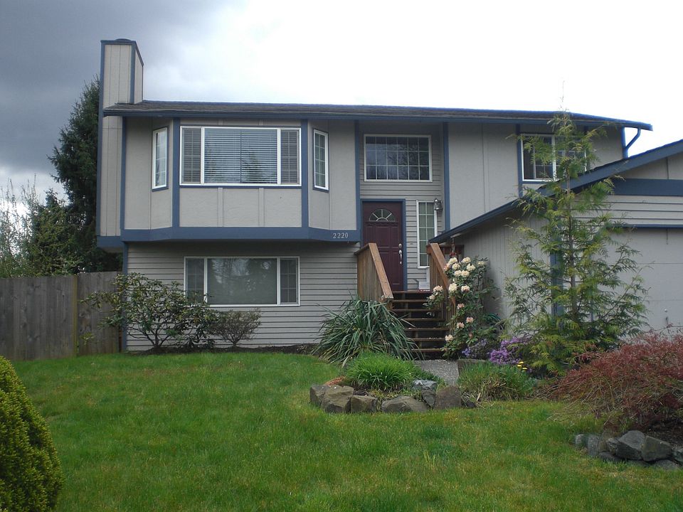 Landscaped front yard welcomes you to this great home