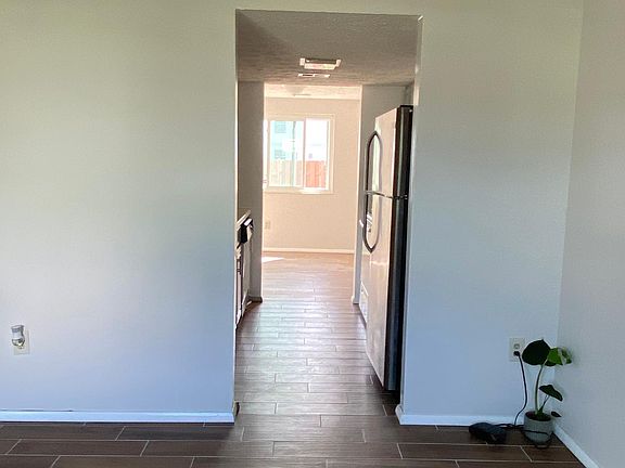 Living room looking into kitchen