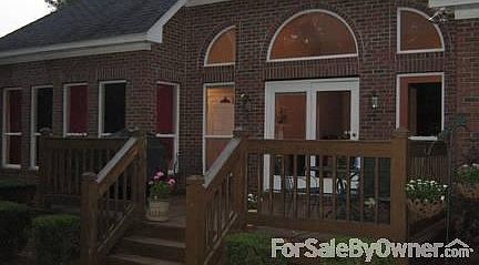Deck with sunroom on left